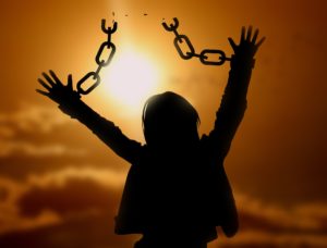 woman sunrise freedom breaking chains