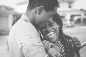 happy black couple smiling
